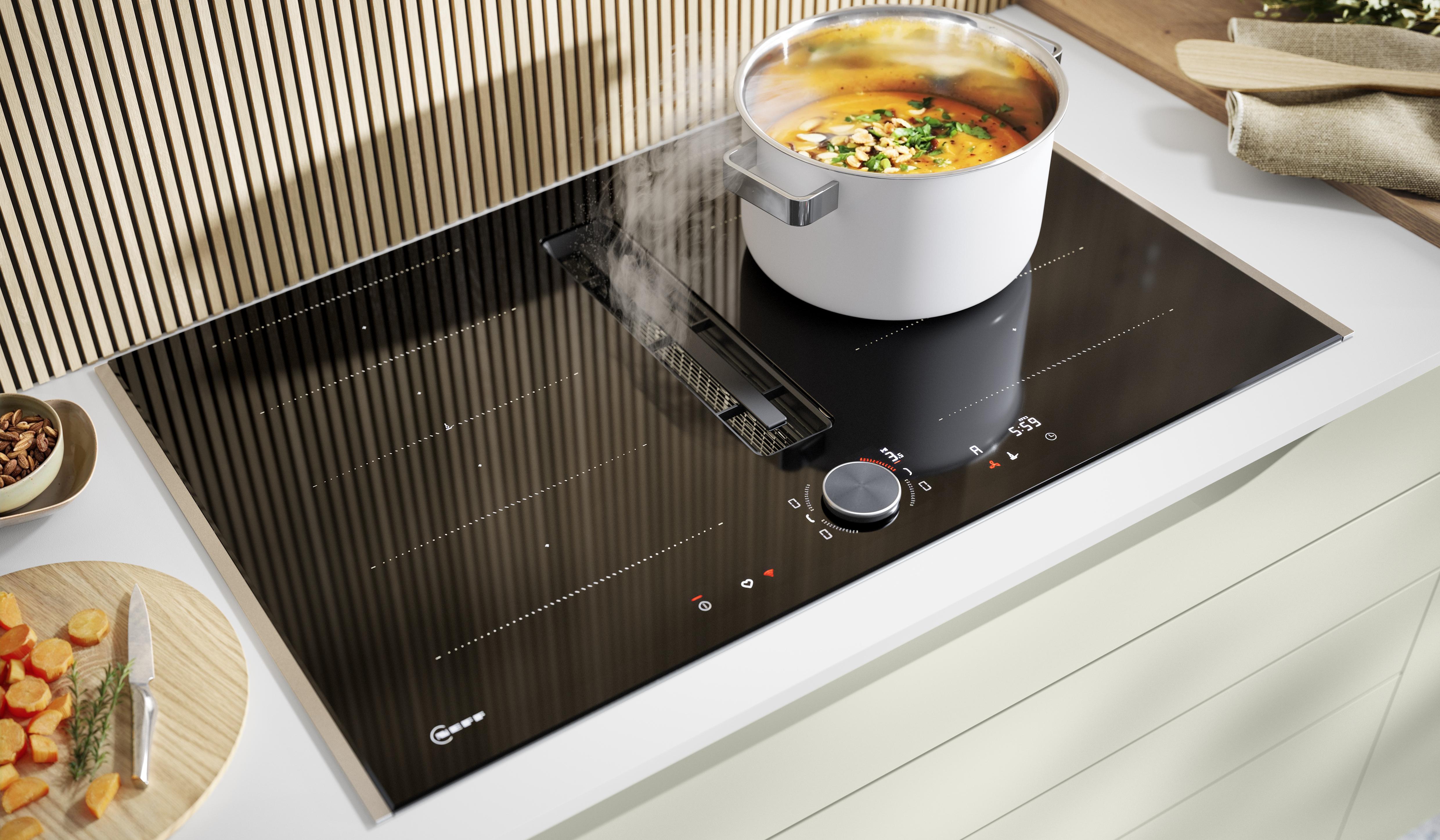 NOBILIA Jadegrün mit Fokus auf Neff Kochfläche